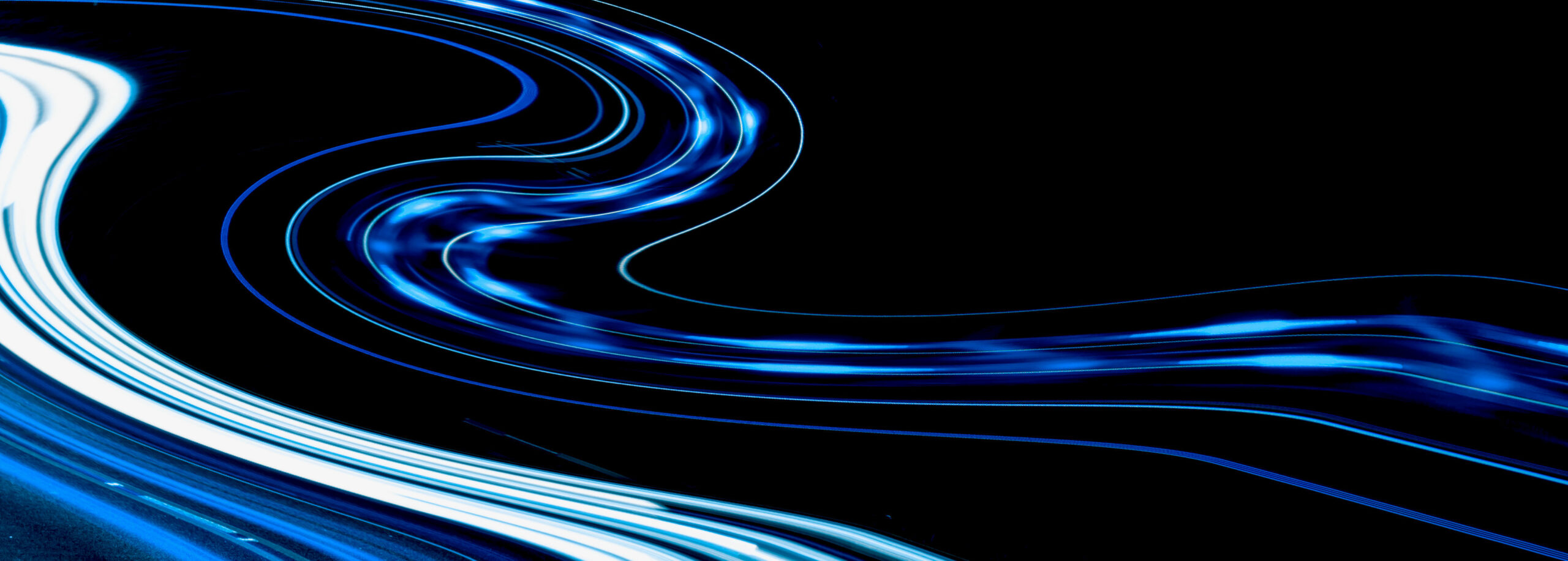 blue car lights at night. long exposure